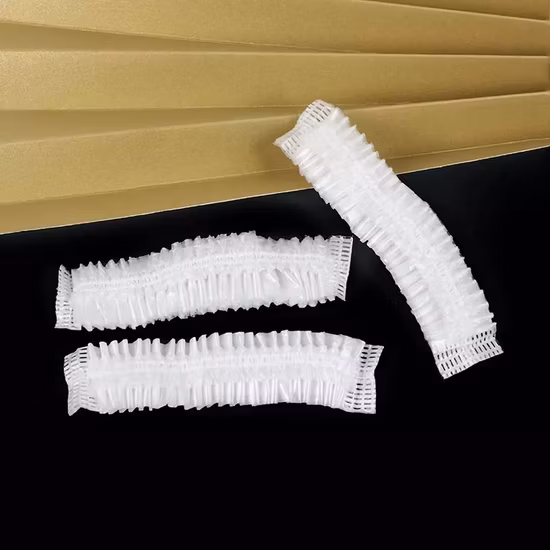 100 Uds. Gorro de ducha transparente desechable de plástico resistente al agua para procesamiento de cabello para mujer, cubierta para el cabello, SPA, salón, Hotel, viaje